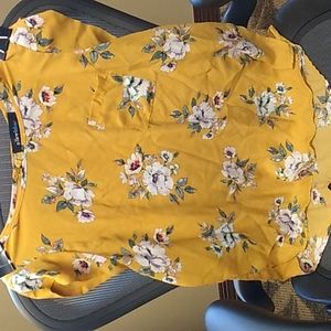 Floral yellow blouse with button neck closure